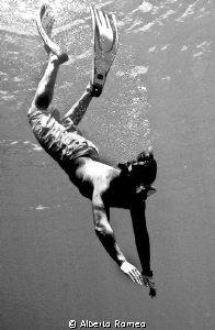 My son skindiving. by Alberto Romeo 